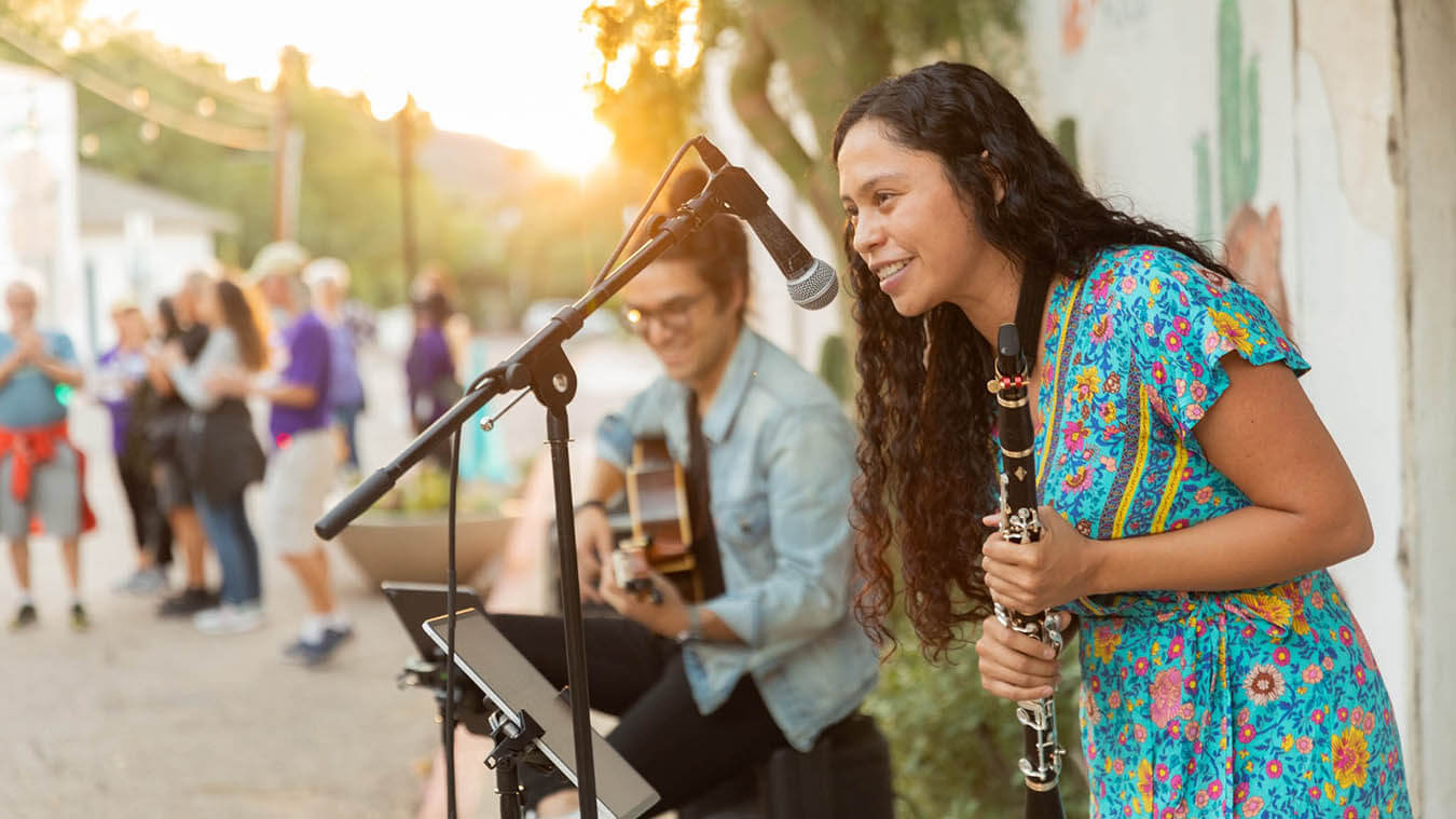 Marks of Distinction: A duo of musicians perform in downtown Tucson.