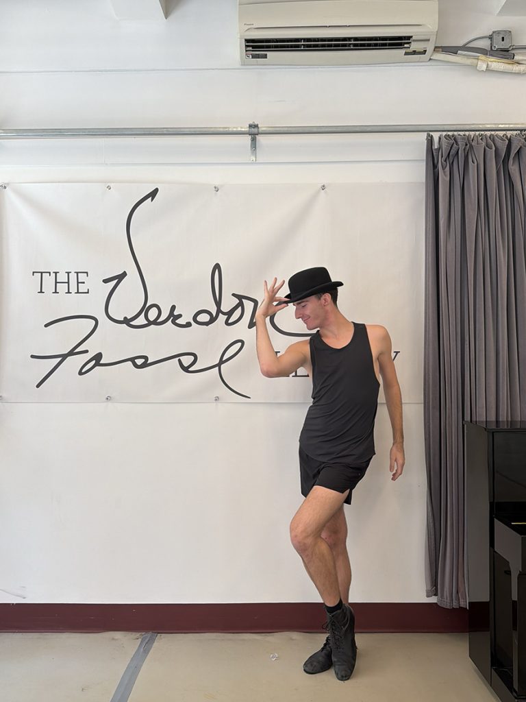 Gavin Michaels poses in front of the The Verdon Fosse banner